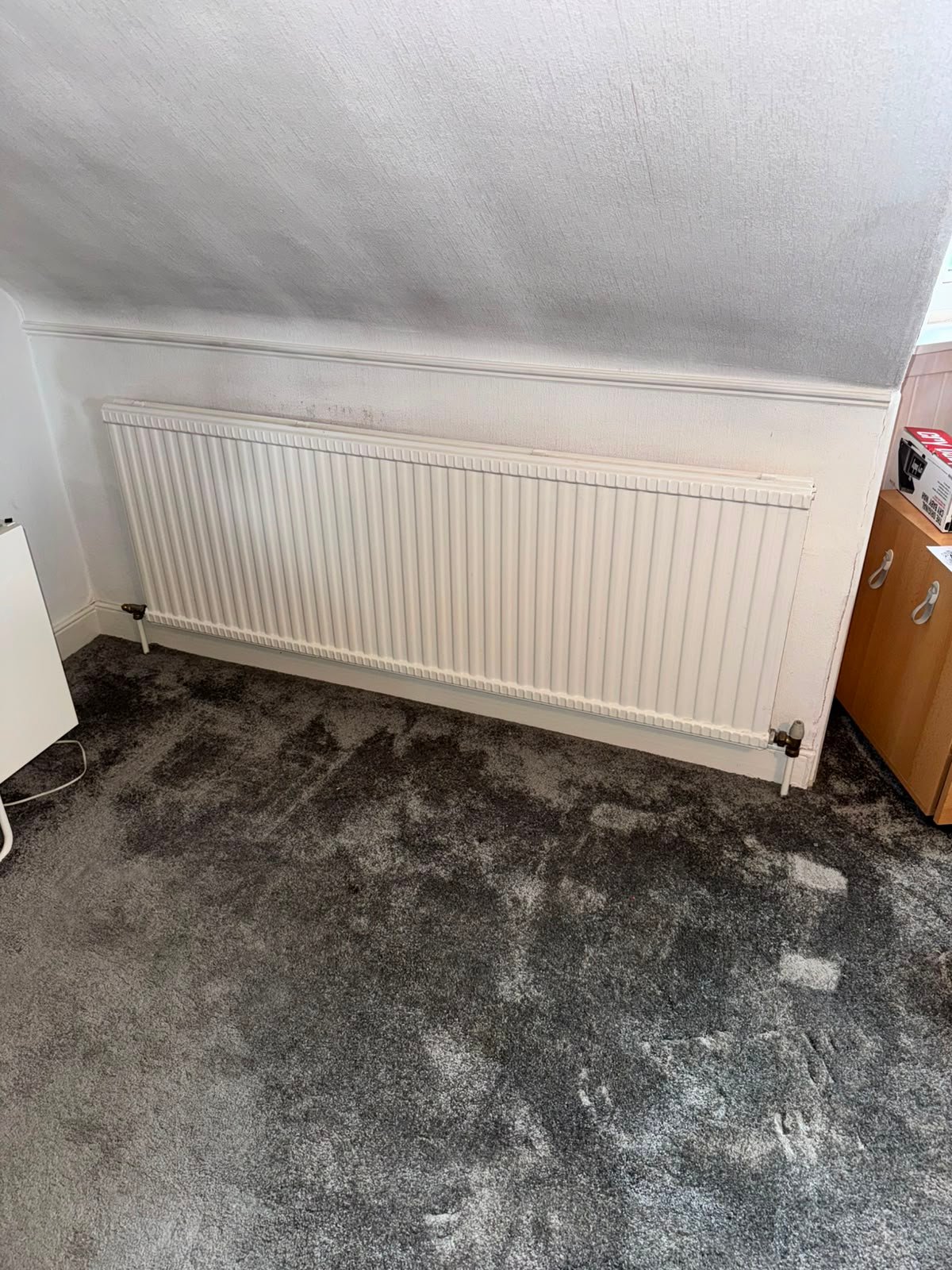 Large old radiator before replacement