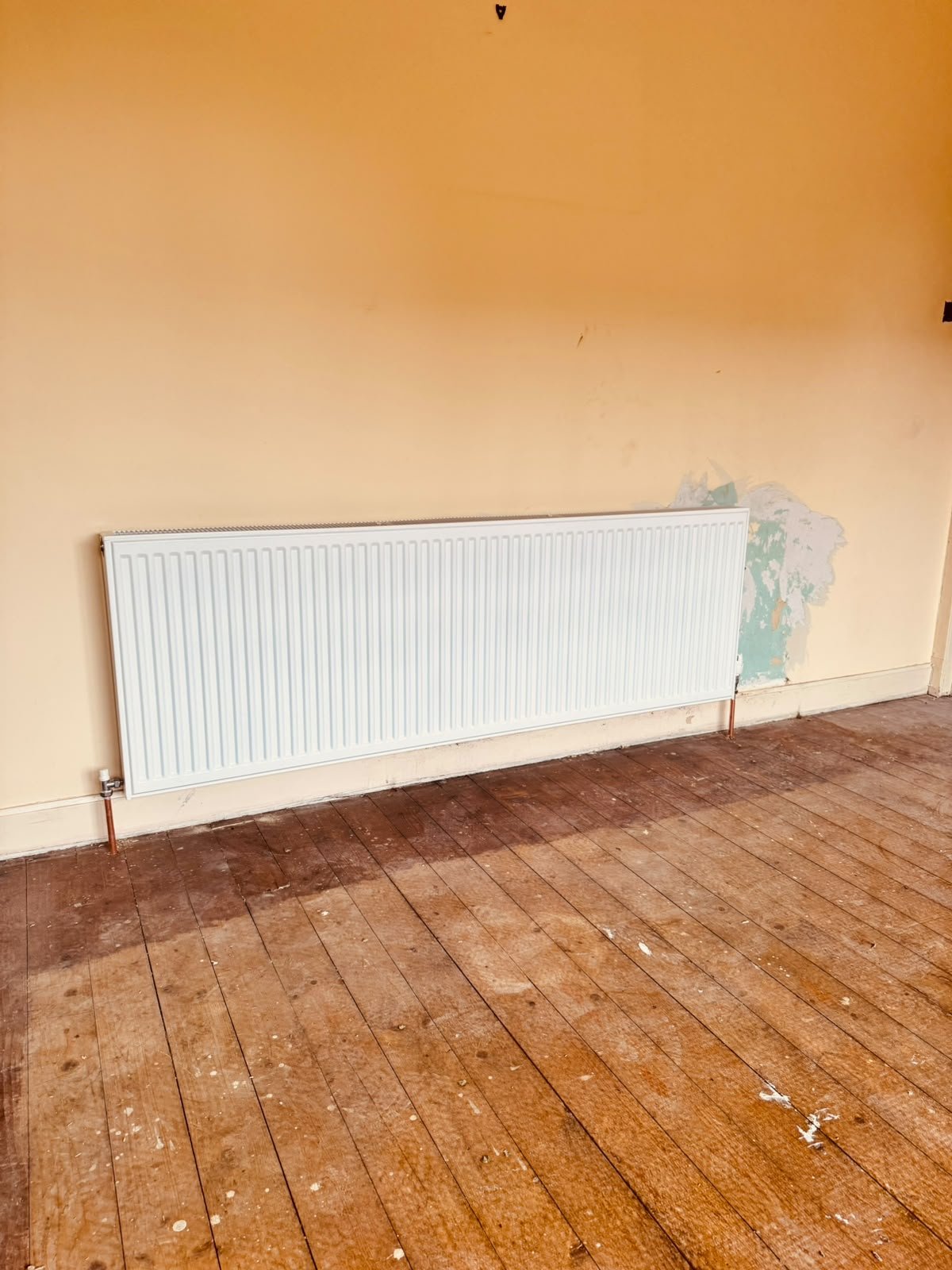 New radiator installed after heating overhaul