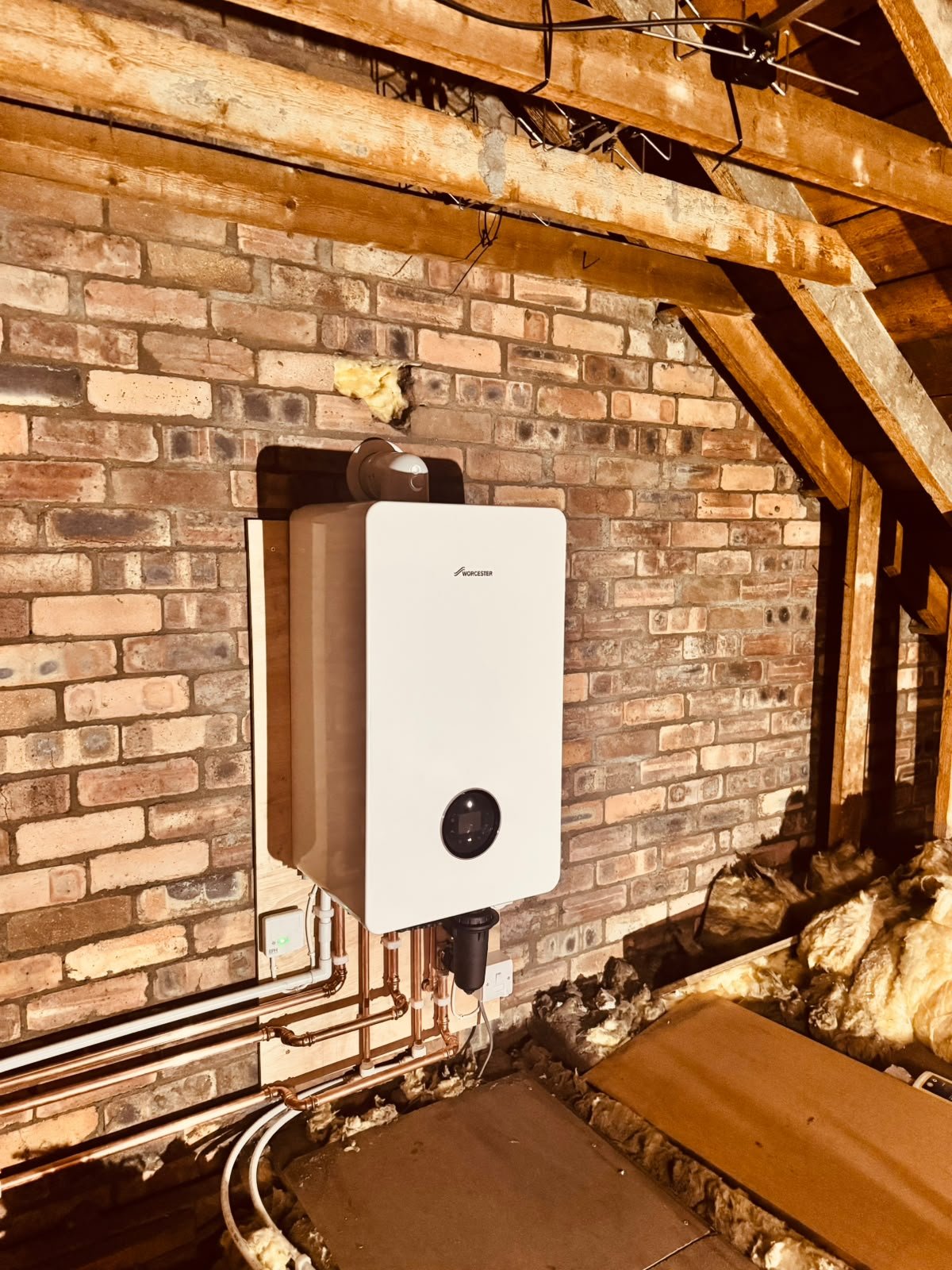 New combi boiler repositioned into loft