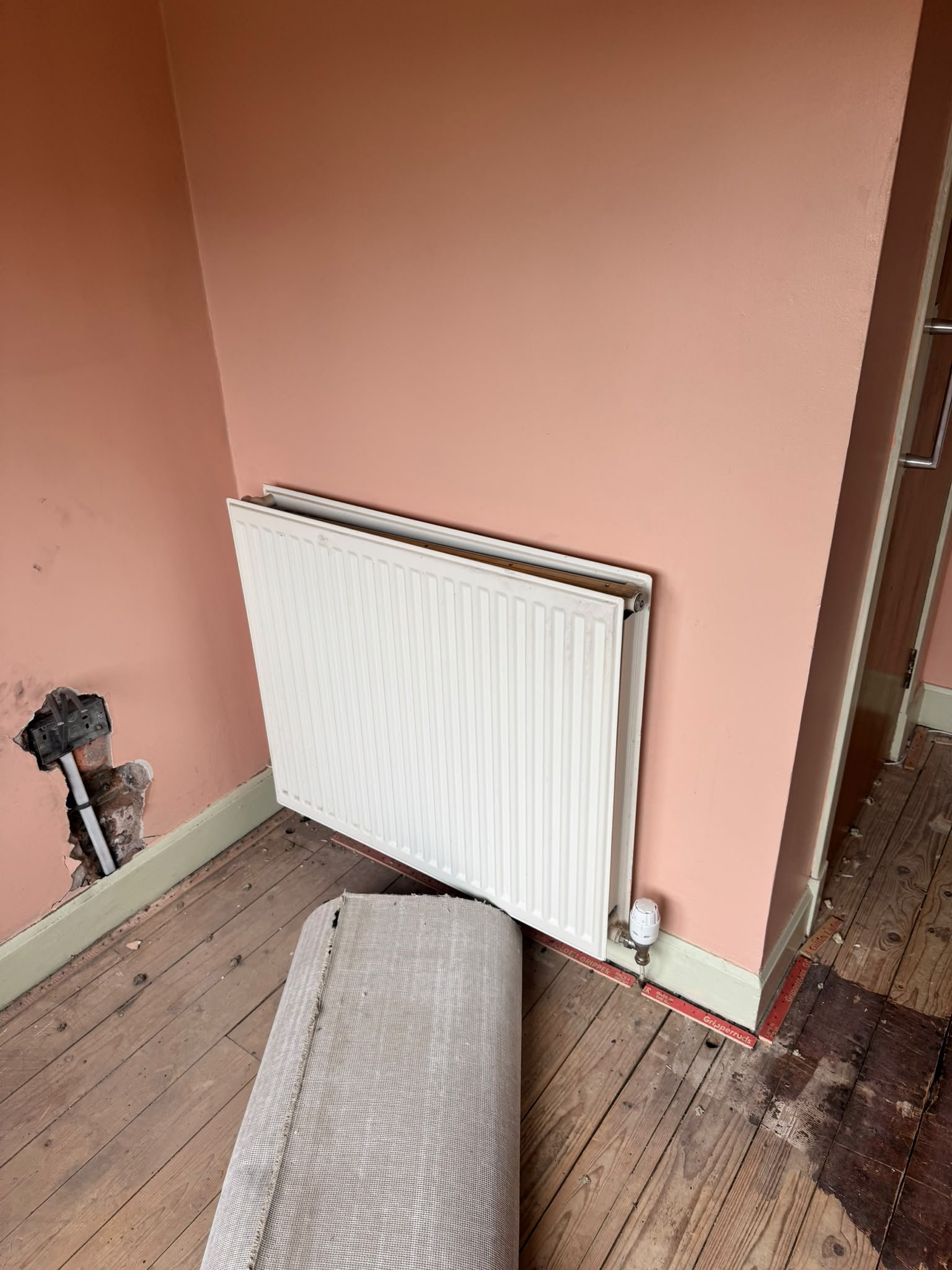 Existing radiator prior to replacement